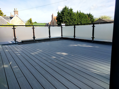Ext. Day. Pub. The Decking to the Flat Roof almost completed.